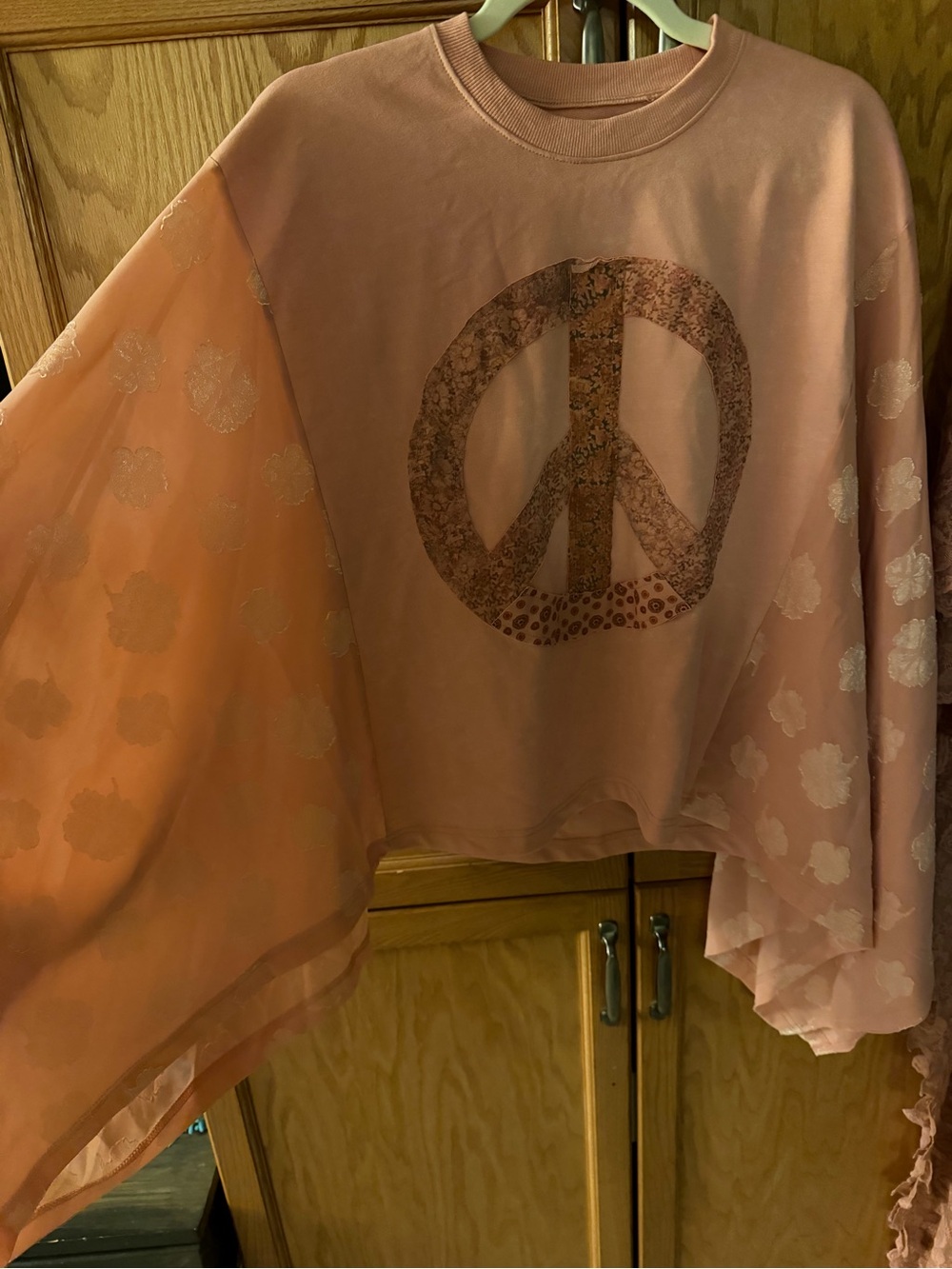 Women's Pink Long-Sleeve Peace Sign Pullover with Sheer Bell Sleeves